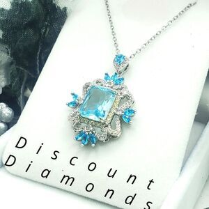 Aquamarine Pendant Necklace surrounded by Baguette Diamonds on 925…